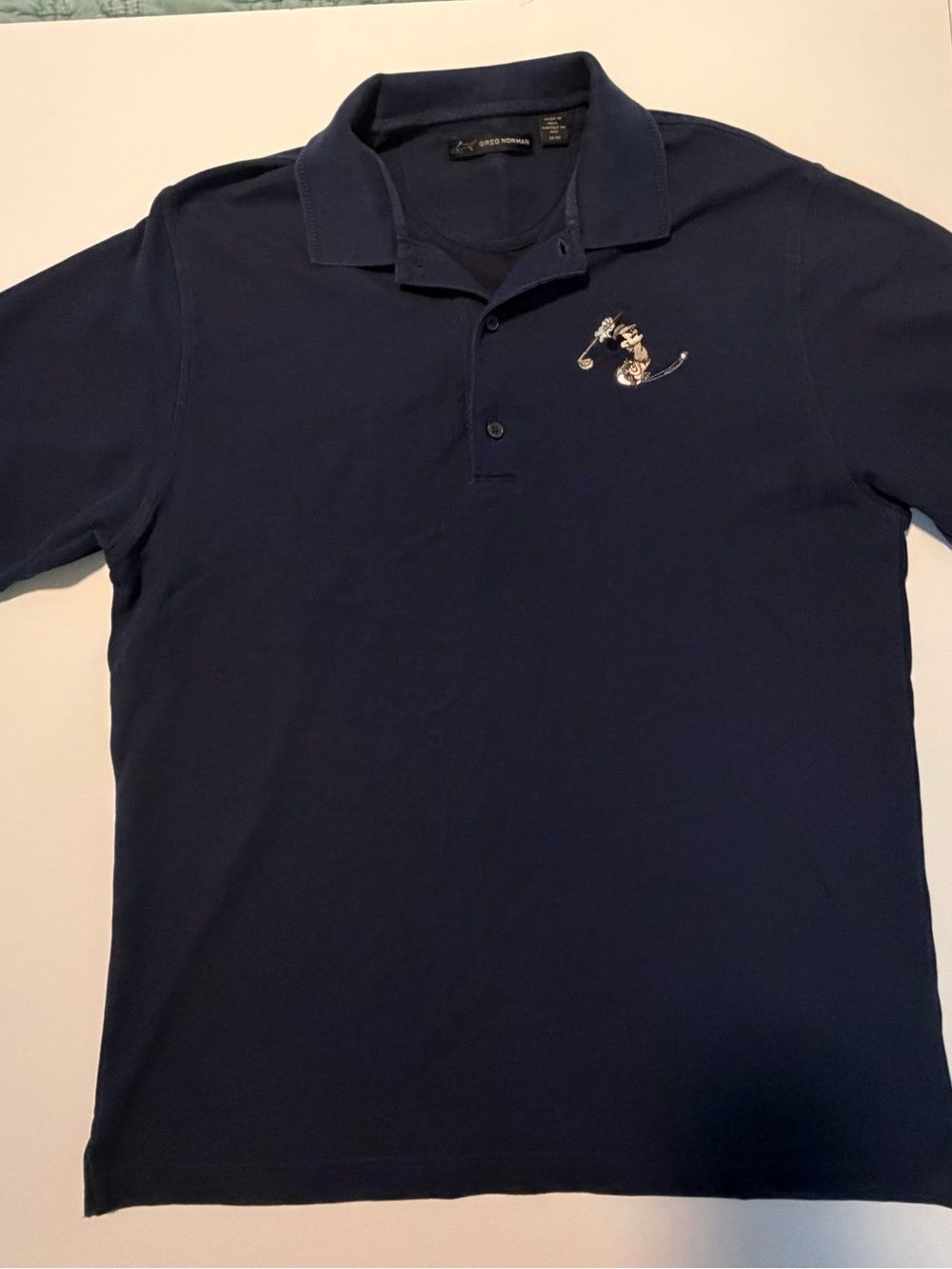 Greg Norman Collection Navy Polo with Embroidered Shark Logo-Med